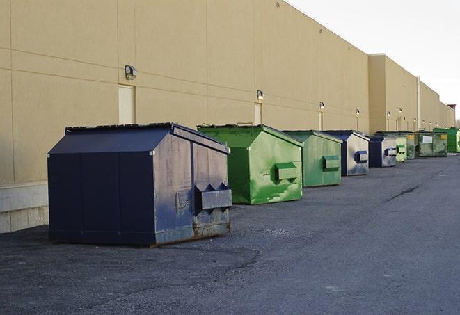 red and green waste bins at a building project in Bon Aqua